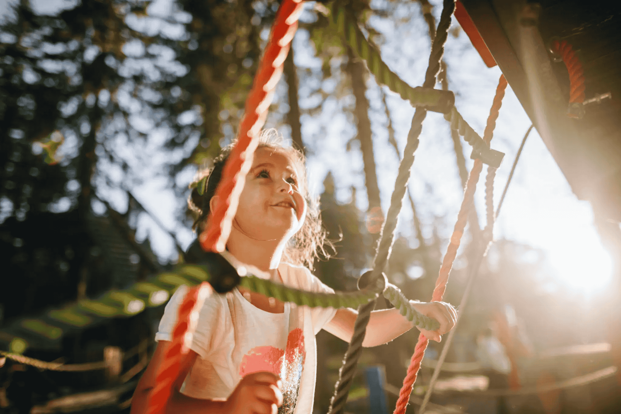 Girl Looking Up In Playground