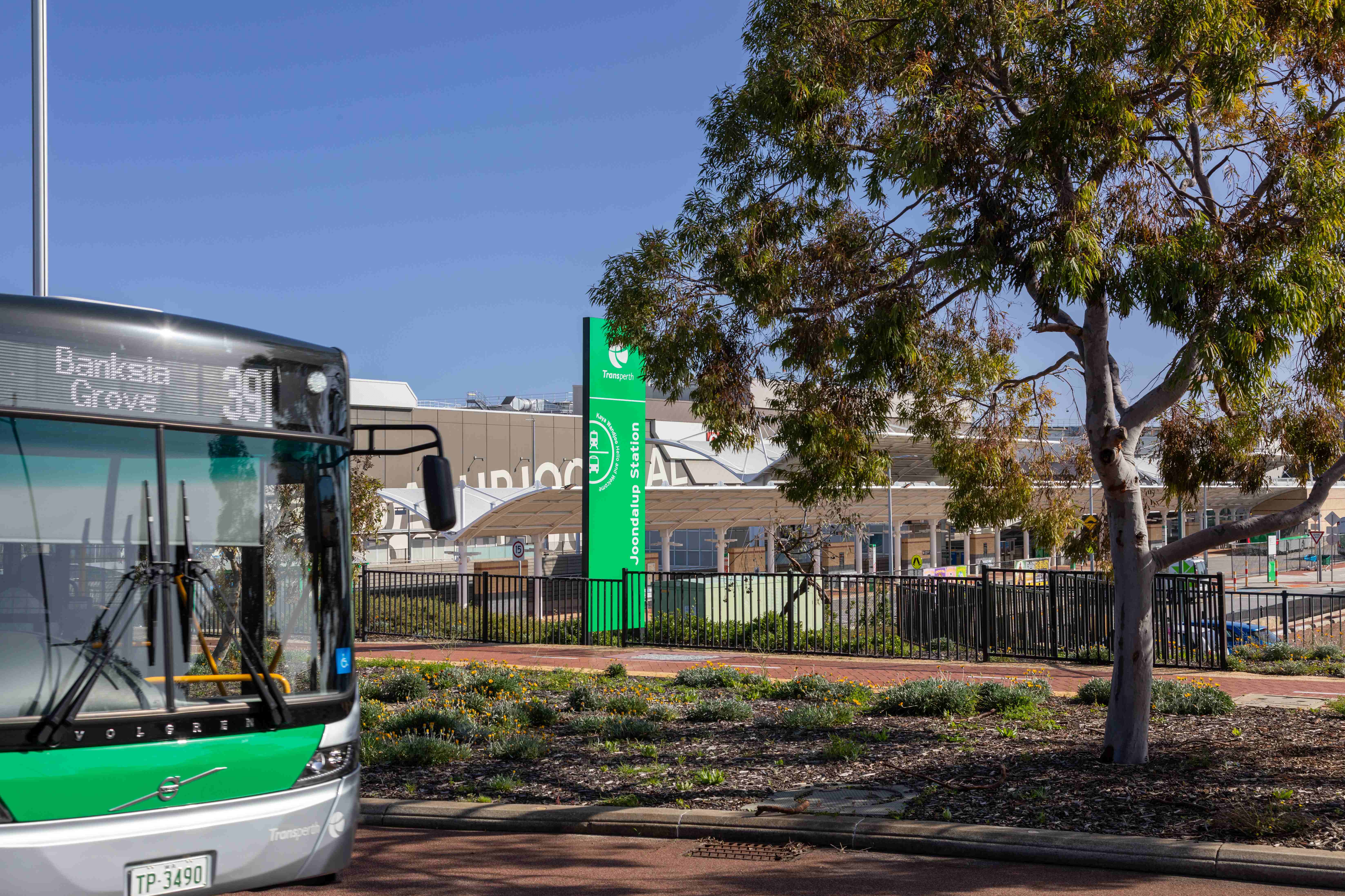 A Transperth bus at Joondalup Station highlights Perth’s eco-friendly transport, connecting to Botania Park’s vision of green spaces, cycling paths, and sustainable travel.
